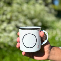 The Plum Village Enamel Mug with an Enso Zen circle