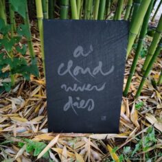 Thich Nhat Hanh’s calligraphy on slate “A Cloud Never Dies