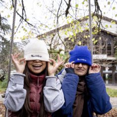 Model wearing the Plum Village beanie