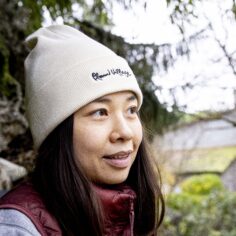 Close-up of the Plum Village Organic Cotton Beanie, showcasing its breathable and soft texture