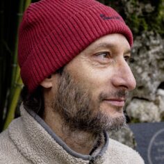 Close-up of the Plum Village Organic Cotton Beanie, showcasing its breathable and soft texture