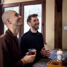 A serene tea meditation illuminated by the Plum Village Mindfulness Candle